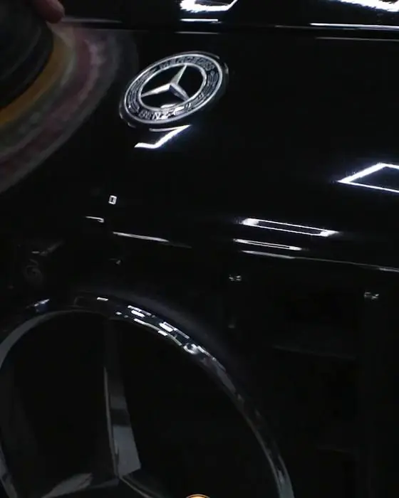 Reflection on a corrected black panel